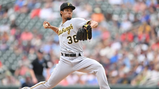 Aug 20, 2023; Minneapolis, Minnesota, USA; Pittsburgh Pirates relief pitcher Dauri Moreta (36) throws a pitch against the Minnesota Twins during the eighth inning at Target Field.